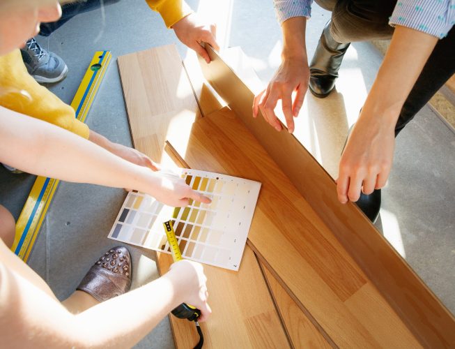 interior-designer-working-with-young-couple
